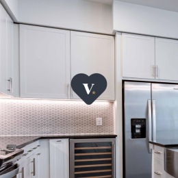 Kitchen view with property logo